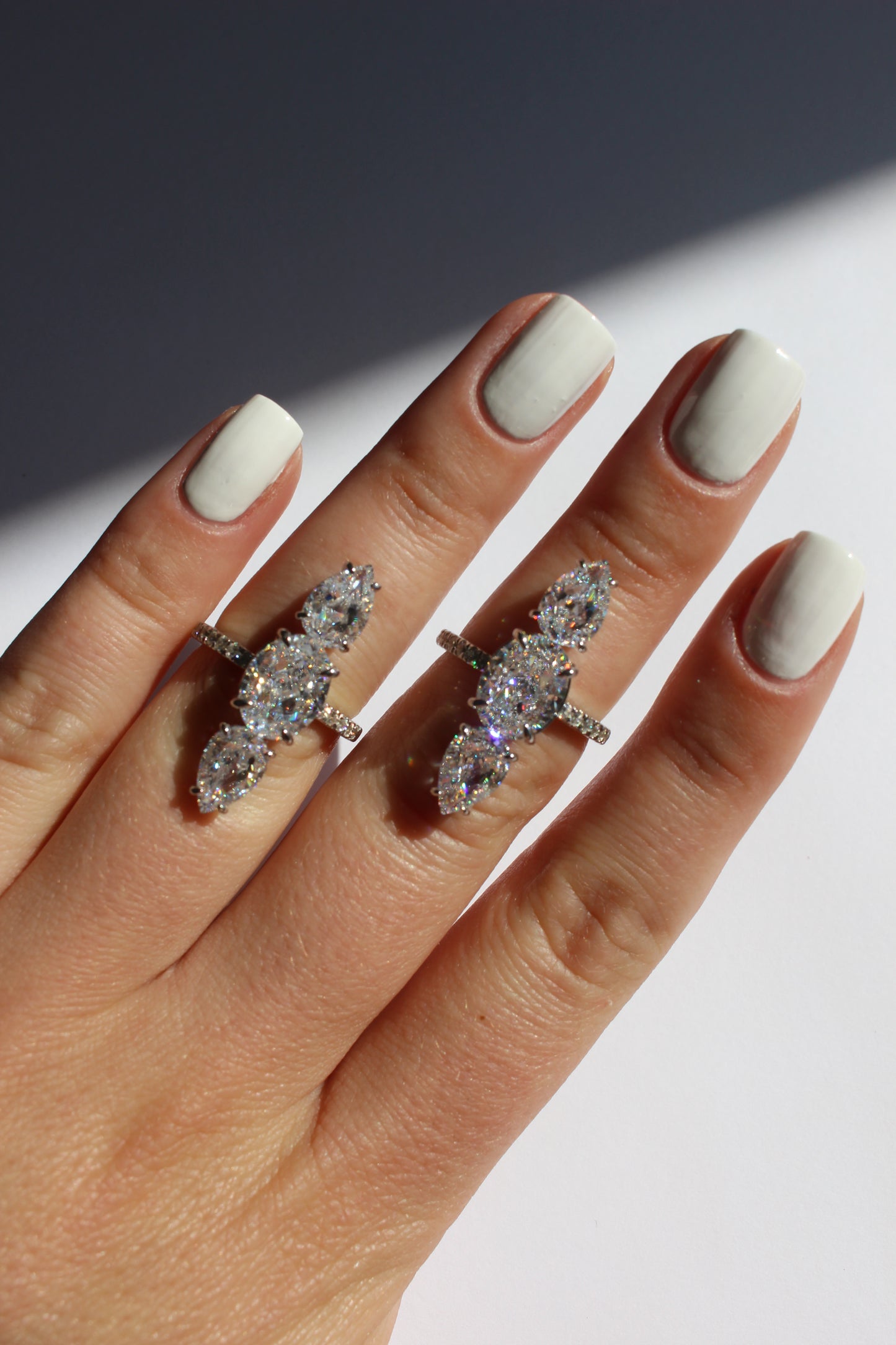Kapli Vertical Oval Cut Three Stone Cubic Zirconia Ring